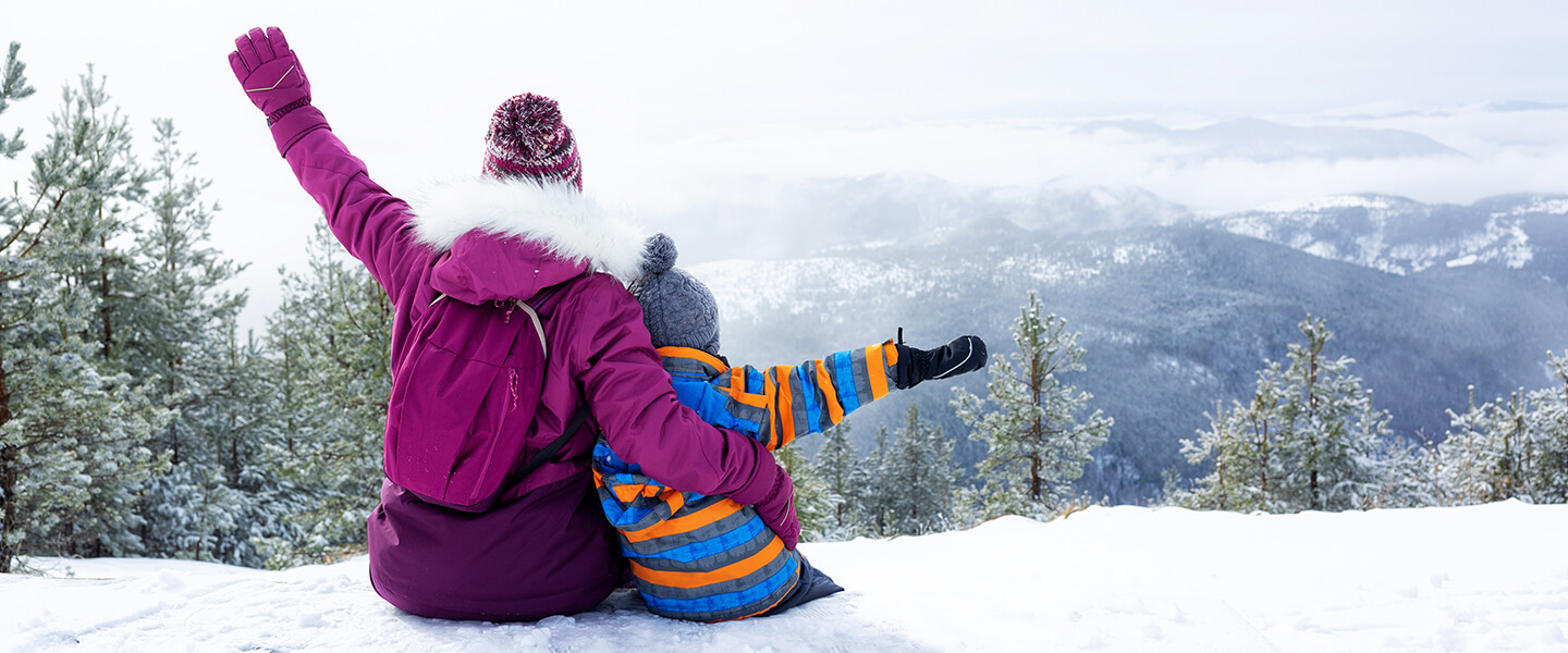 Family mountain vacation in the snow