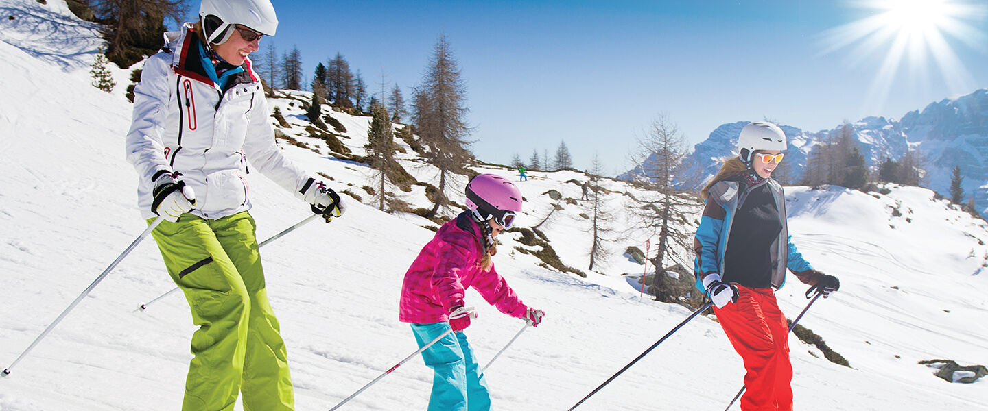 Family on skis